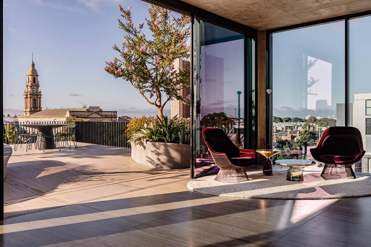 Piccolo House by Wood Marsh features coloured reflective glass elements in South Melbourne