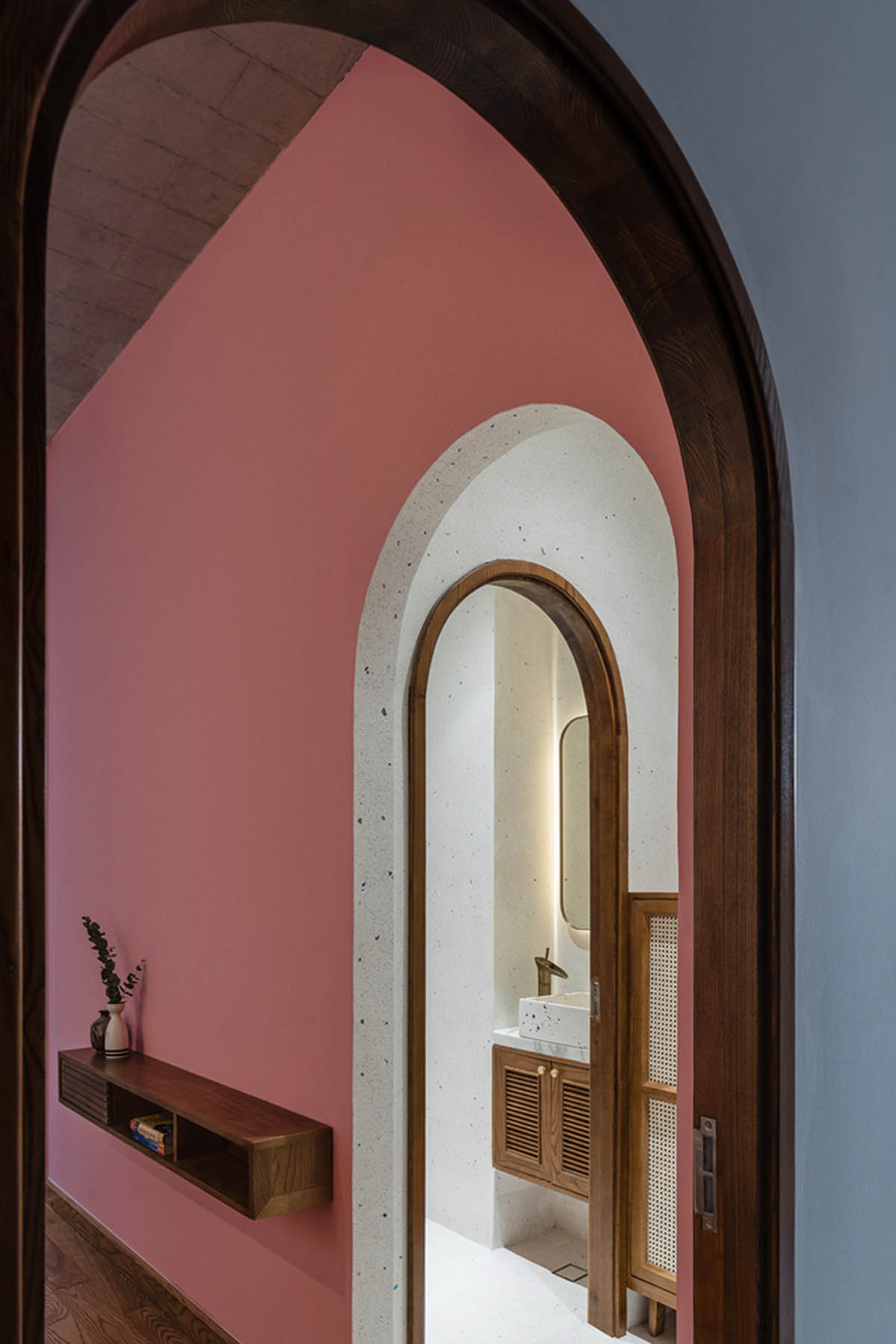 AD9 Architects built residence on a narrow plot with half-circled balconies in Vietnam