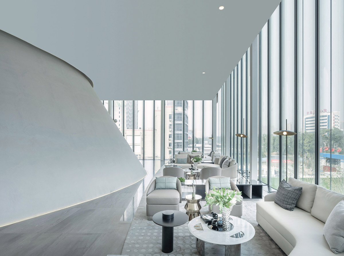 Community Center in Xi&rsquo;an is raised on sculptural base that features a rippling effect