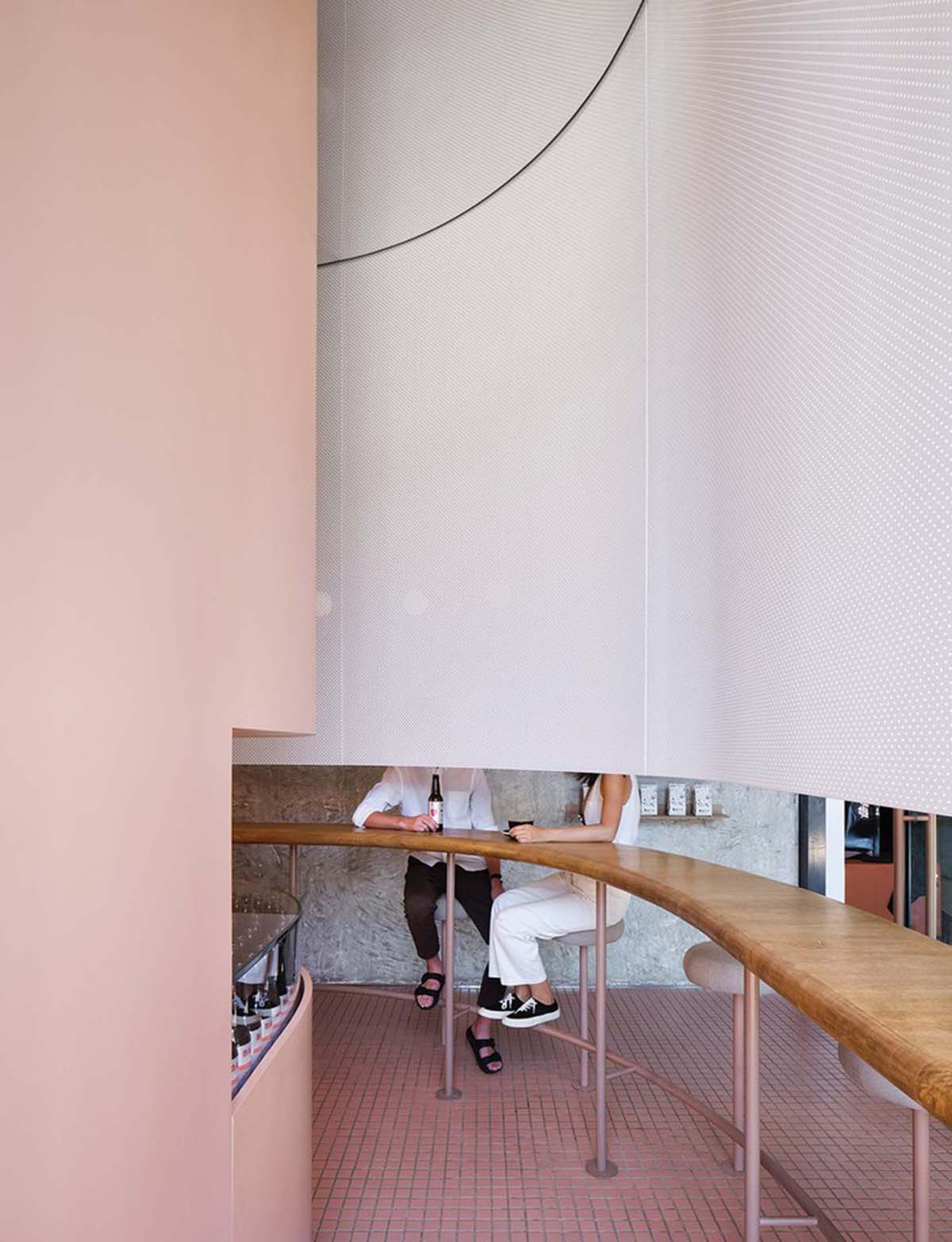 Office AIO designs cafe with pink and artistic interiors in a renovated historic building in Beijing