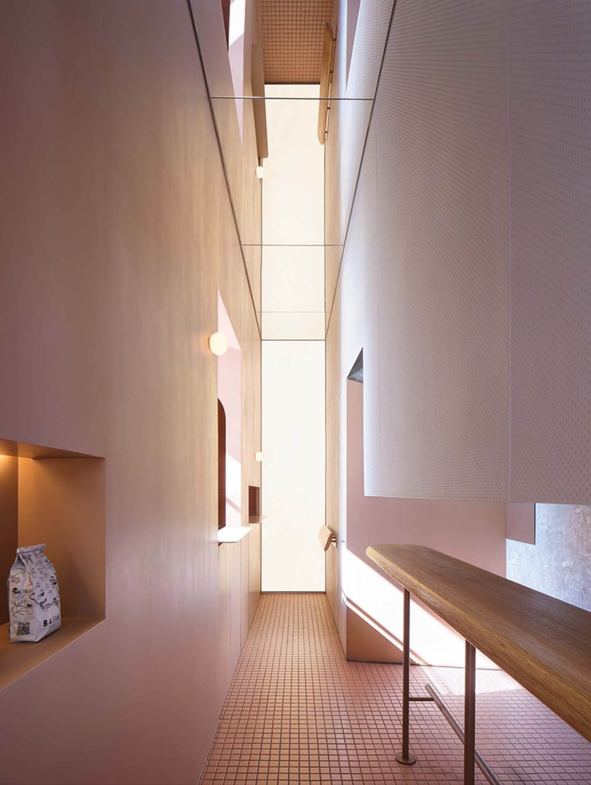 Office AIO designs cafe with pink and artistic interiors in a renovated historic building in Beijing