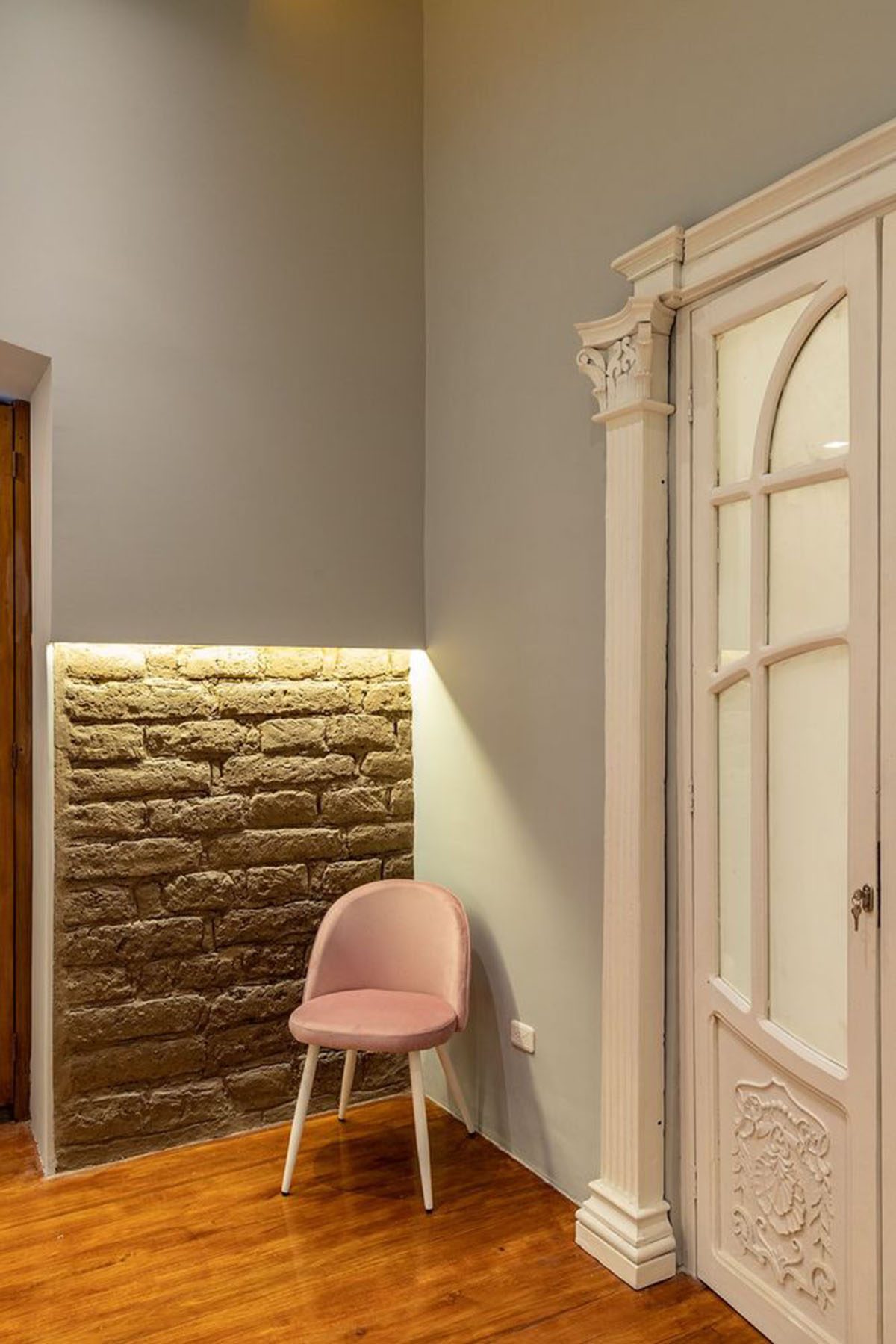 nicolas&nicolas converts old building into hotel with pinkish walls and central courtyard in Quito