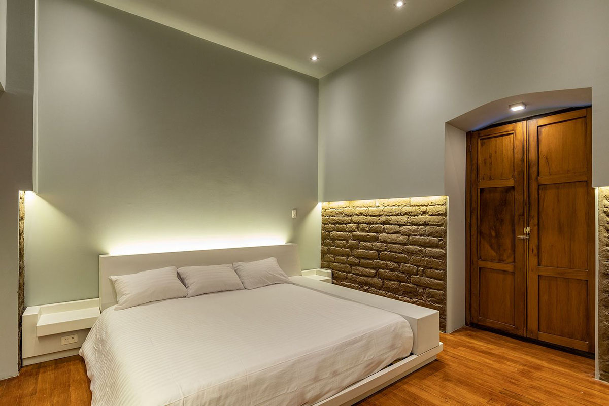 nicolas&nicolas converts old building into hotel with pinkish walls and central courtyard in Quito