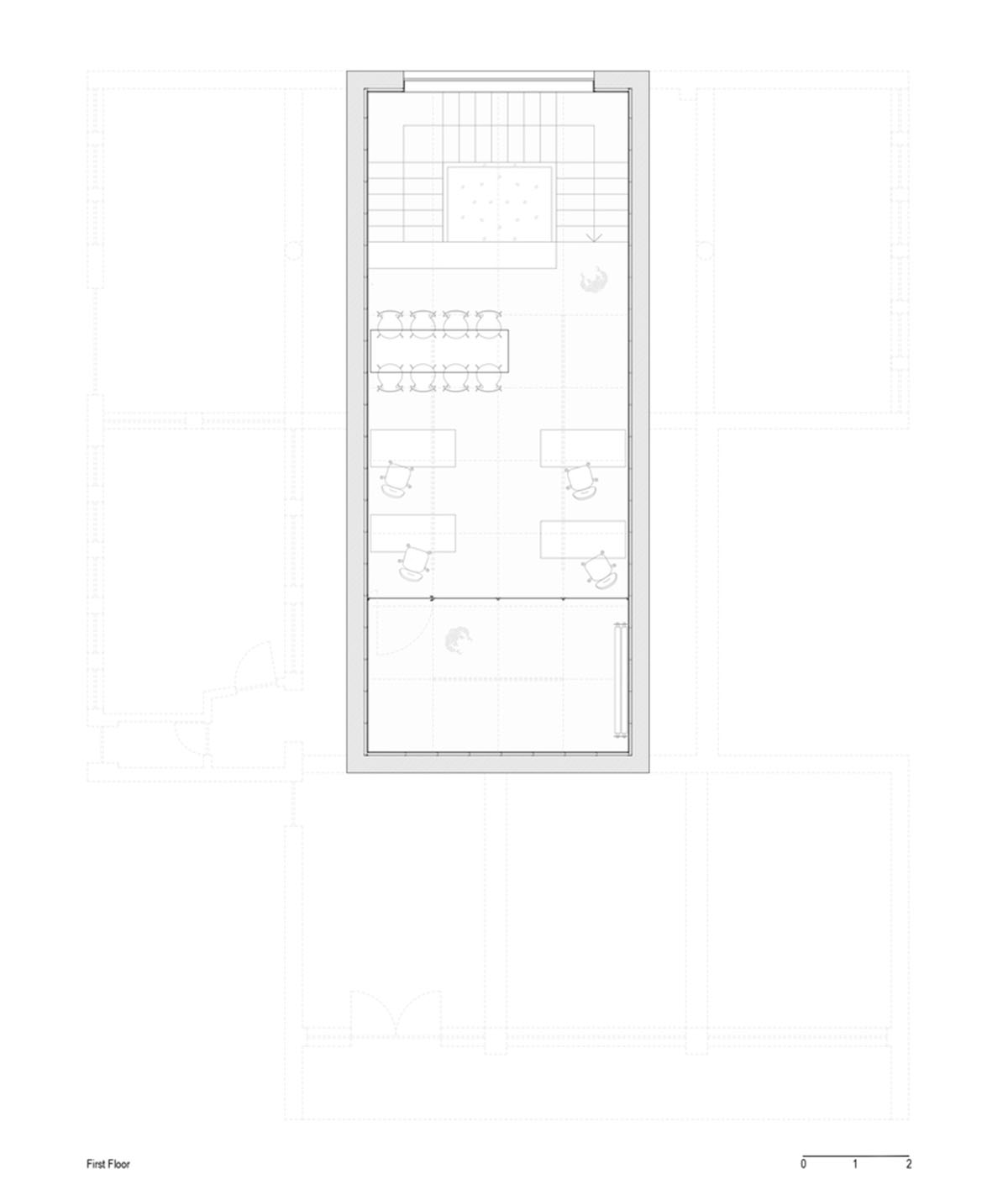 stu.dere divides interior space with golden wire meshes for multiple uses in this store in Portugal