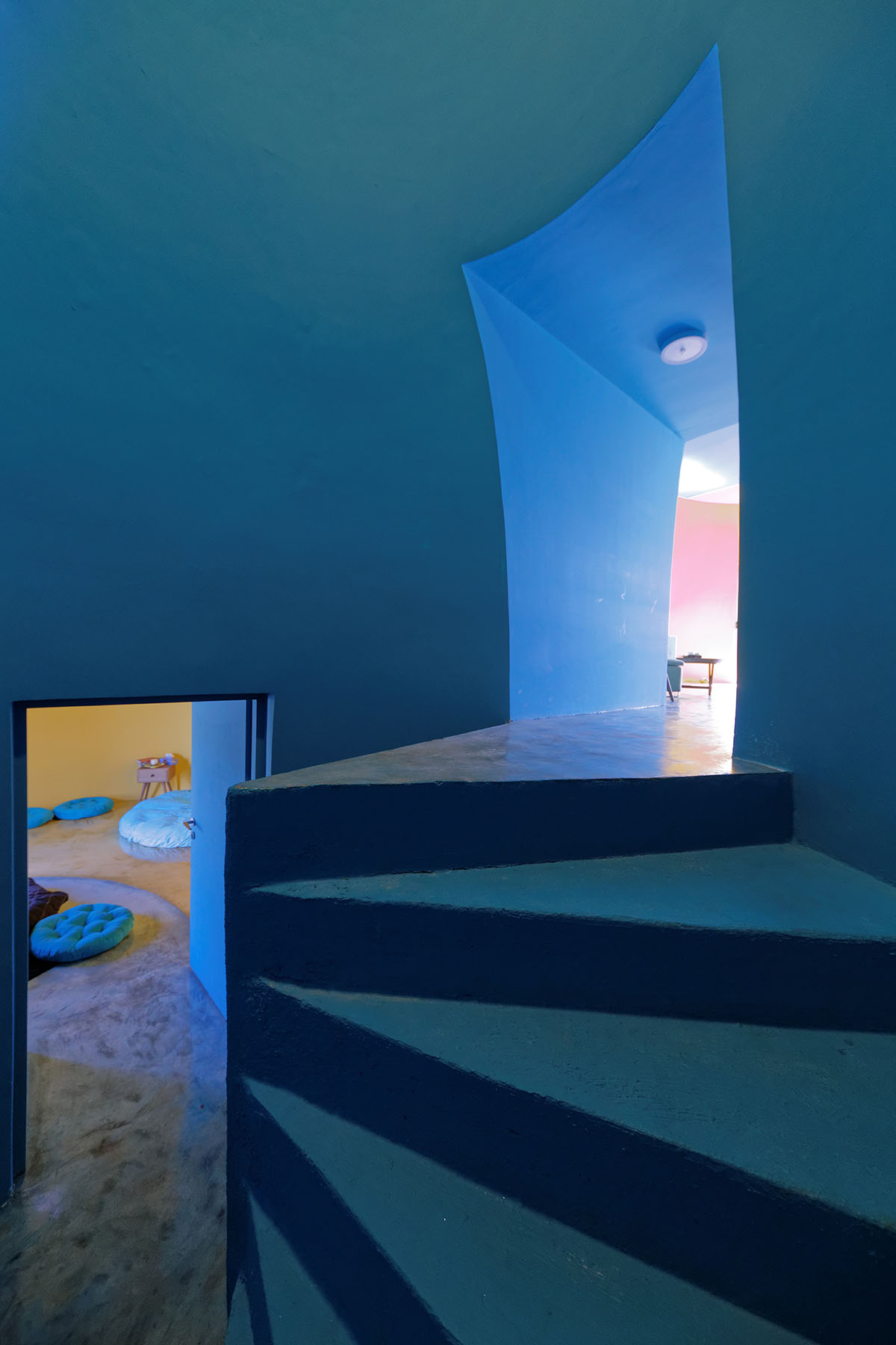 ZAV Architects built colorful-domed housing made of rammed earth and sand on Hormuz island, Iran