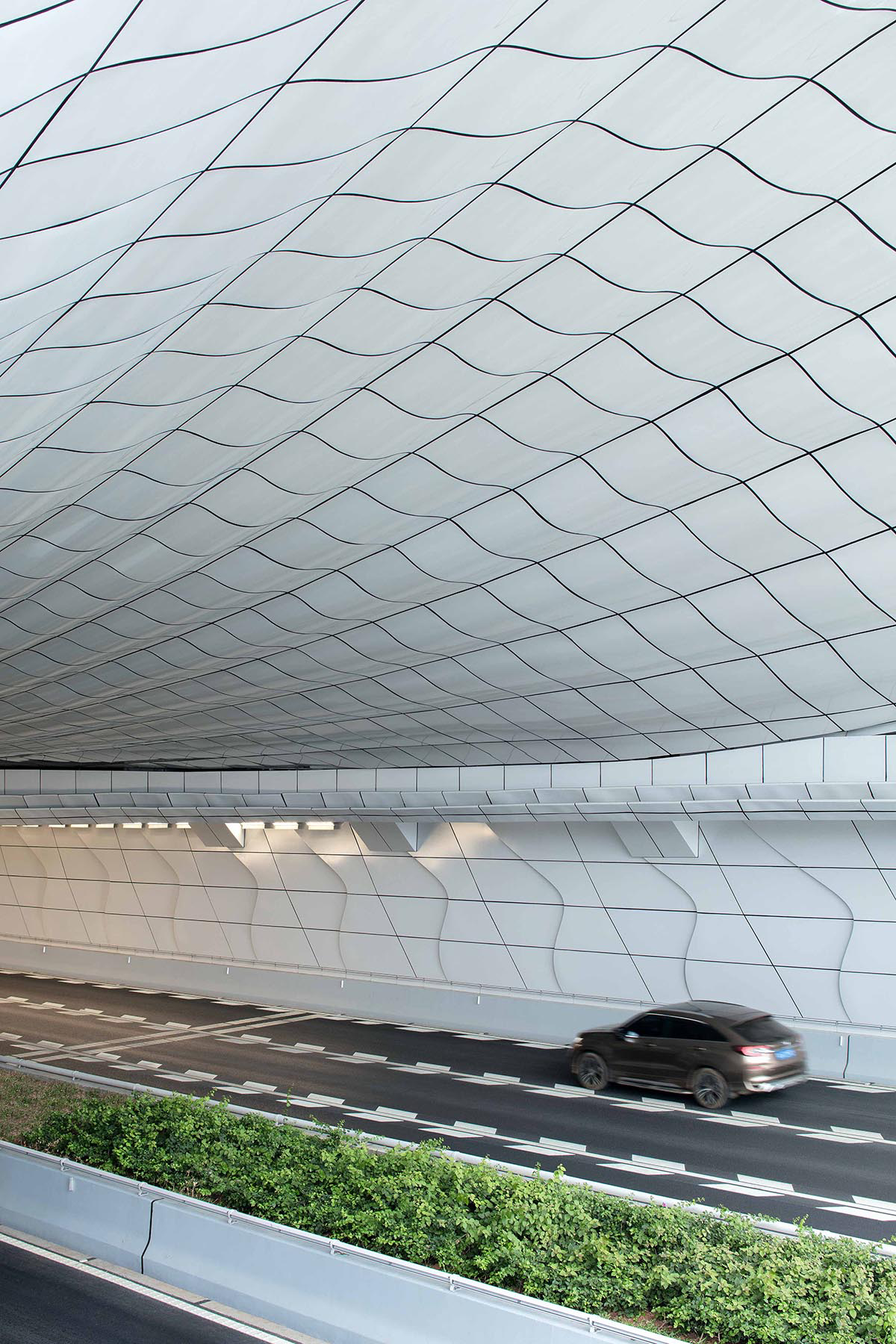 Penda China completes madeleine-shaped portal for Haikou Wenming East Road Tunnel in China