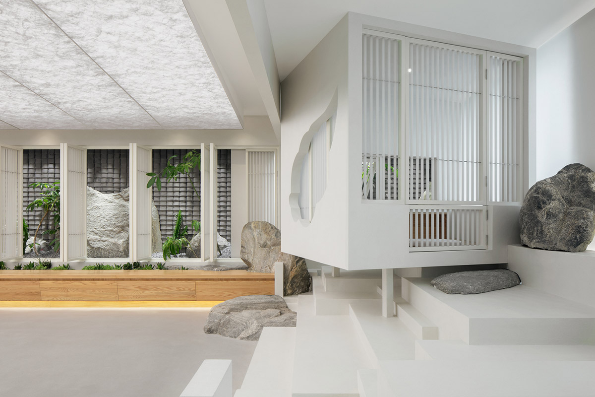 Jiejie studio wraps this tea room with a peach garden with rocky and forest landscape in Beijing