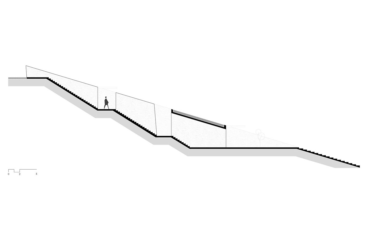 MOLD Architects used advantages of sloping land to design Ncaved house in Greece