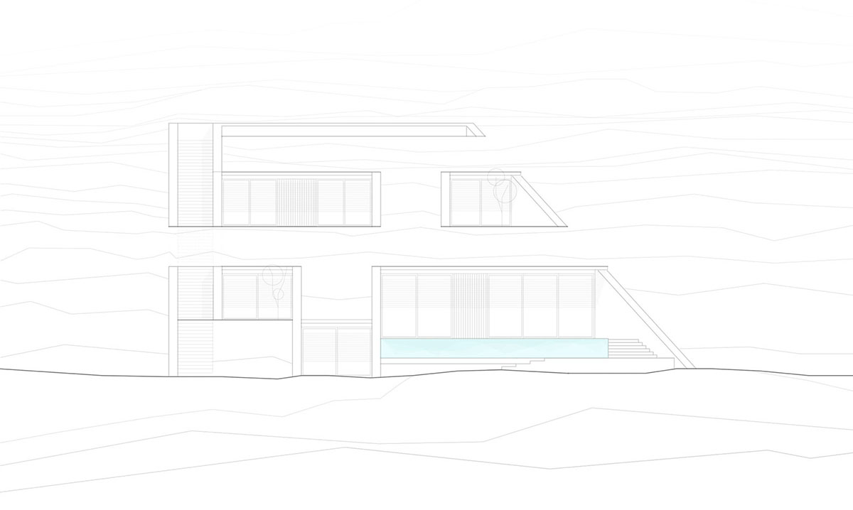 MOLD Architects used advantages of sloping land to design Ncaved house in Greece