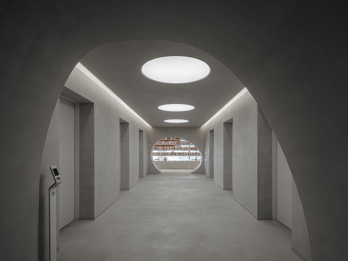 Wutopia Lab creates surprising interiors with cut-out forms in The Satori Harbor Library in Guangzhou