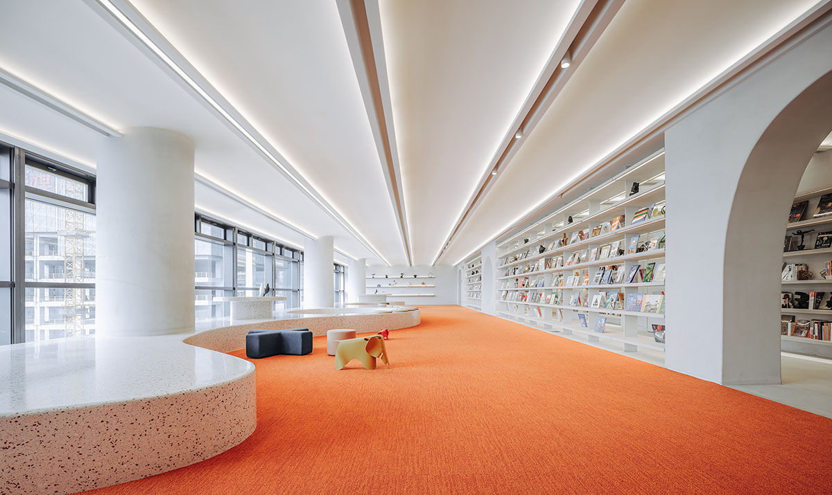 Wutopia Lab creates surprising interiors with cut-out forms in The Satori Harbor Library in Guangzhou