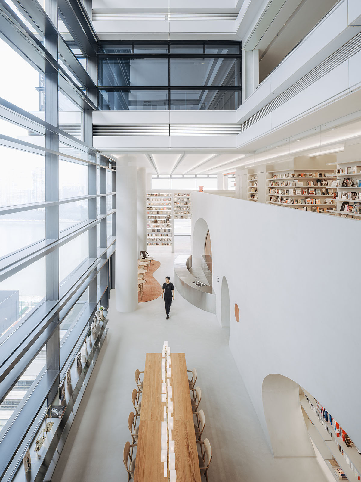 Wutopia Lab creates surprising interiors with cut-out forms in The Satori Harbor Library in Guangzhou