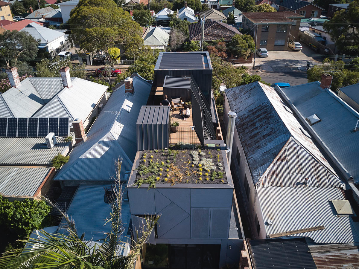 Austin Maynard Architects adds glass volume to the original Dutch-gabled facade in Melbourne