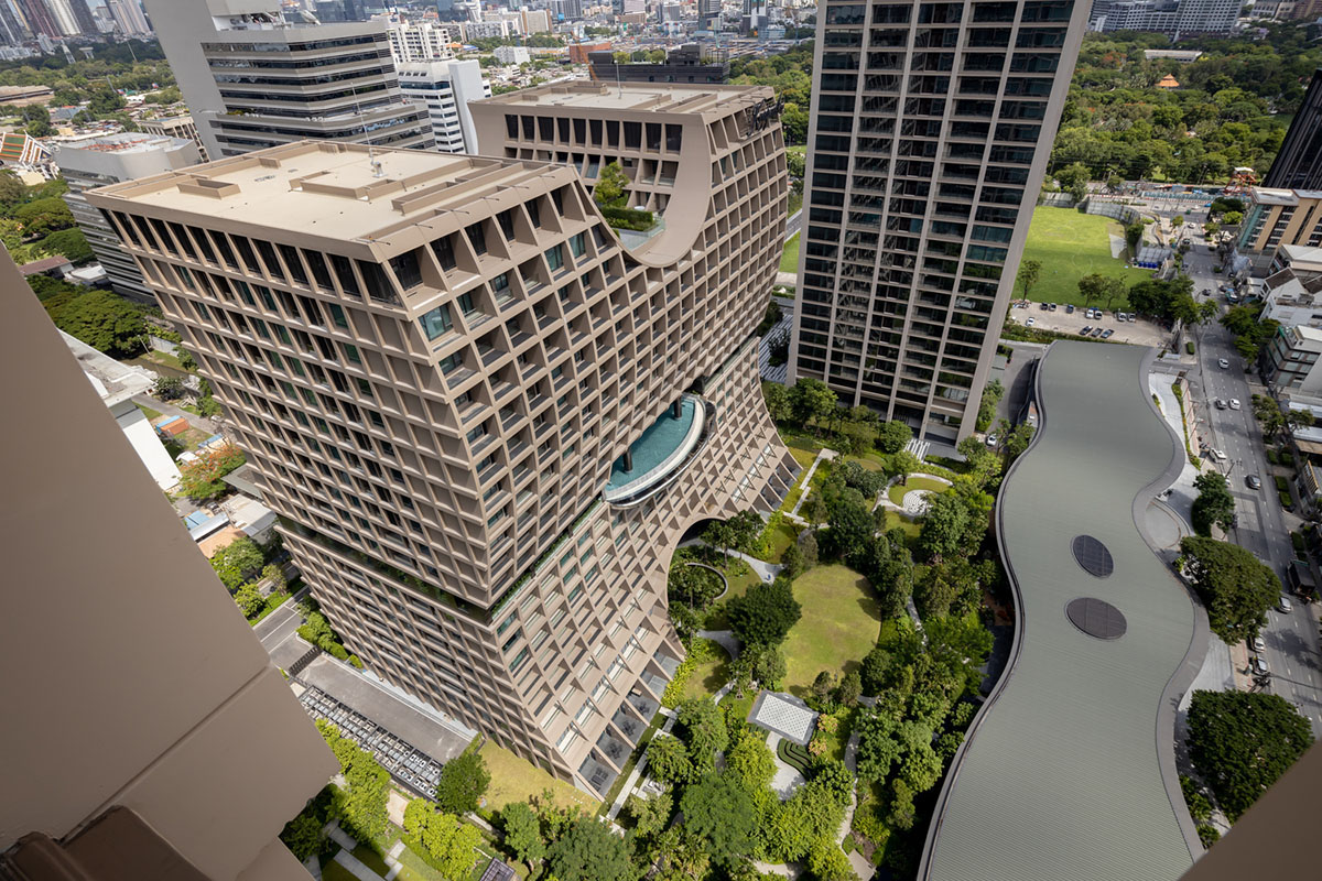 Plan Architect built gridded hotel that features cave-like entrance in Thailand