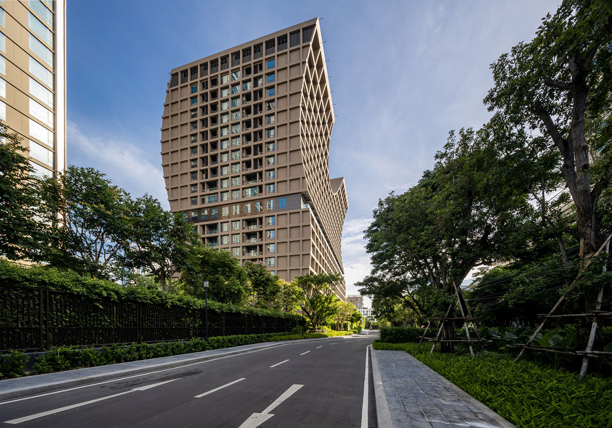 Plan Architect built gridded hotel that features cave-like entrance in Thailand