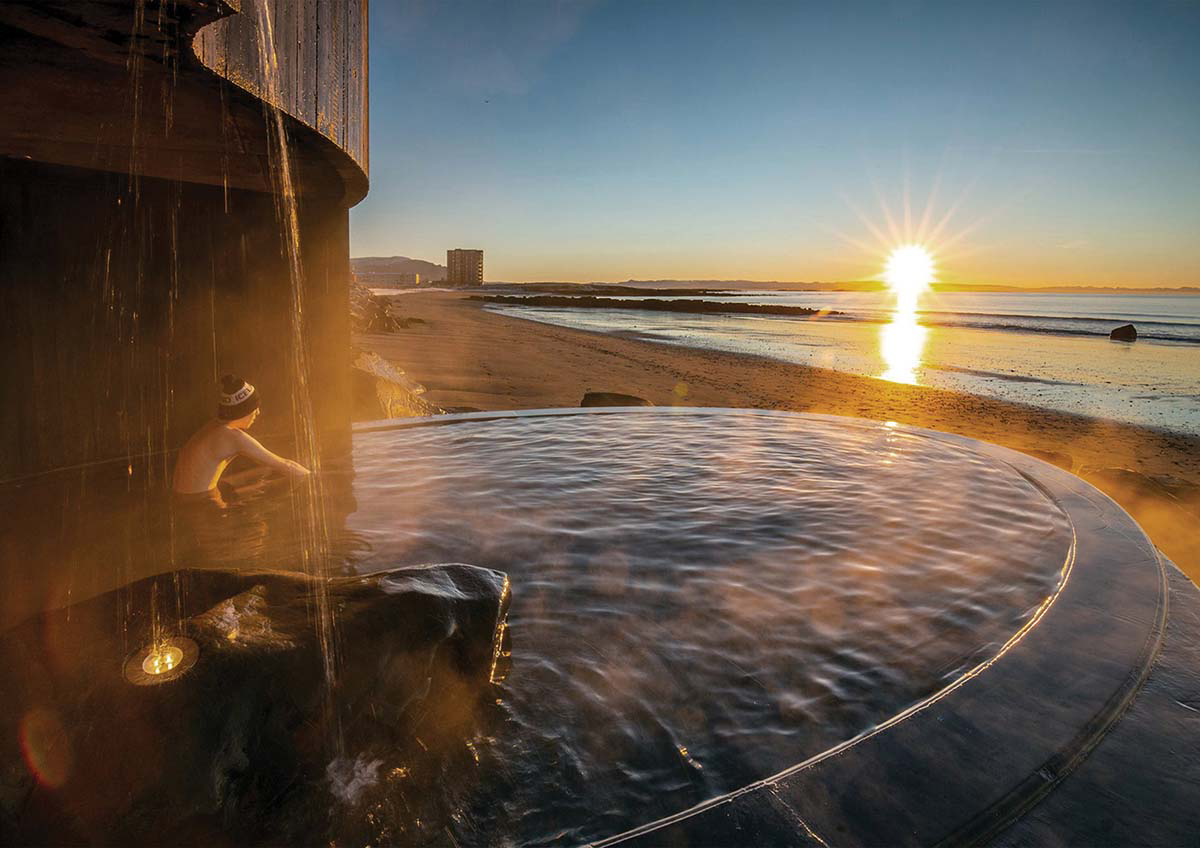 Basalt Architects' Guðlaug Baths inspired by little sea pools nestled in rocky barrier in Iceland