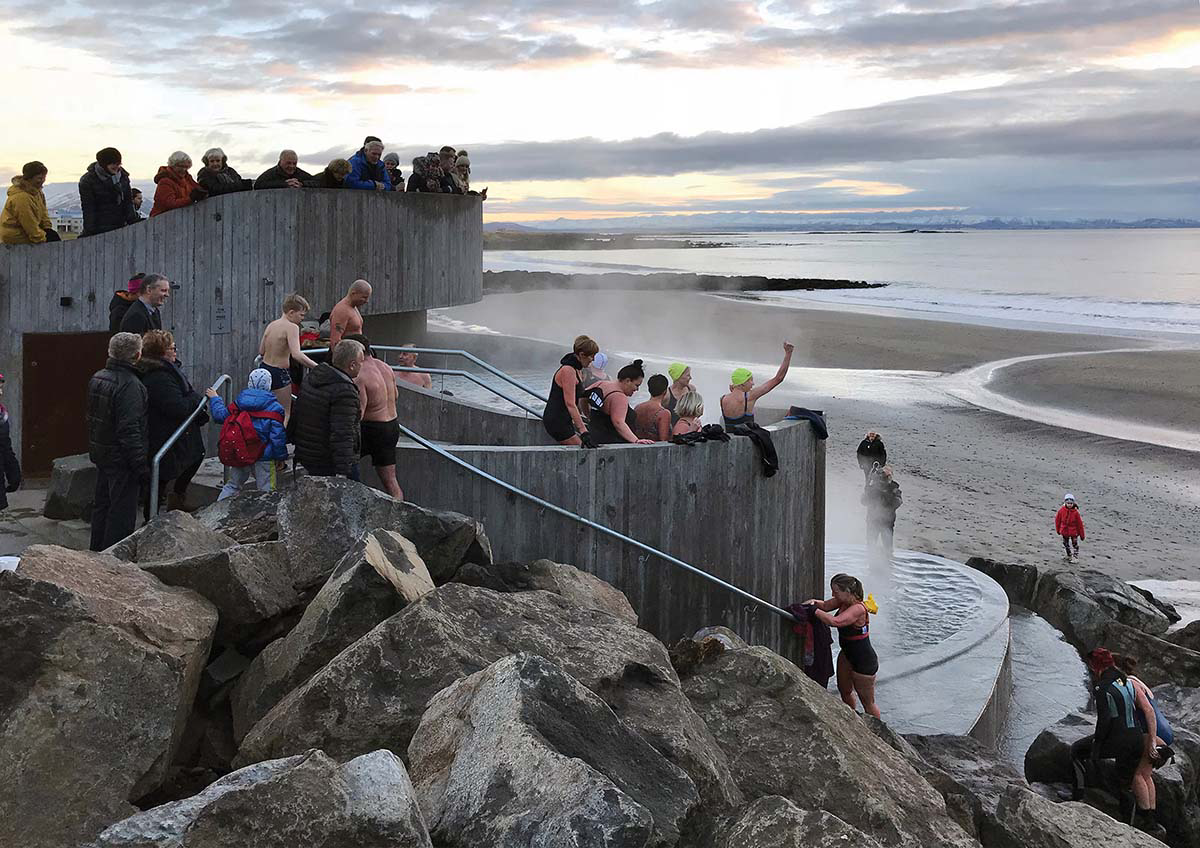 Basalt Architects' Guðlaug Baths inspired by little sea pools nestled in rocky barrier in Iceland