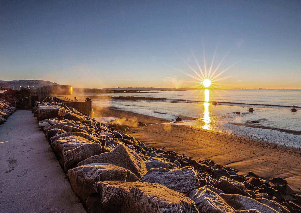 Basalt Architects' Guðlaug Baths inspired by little sea pools nestled in rocky barrier in Iceland