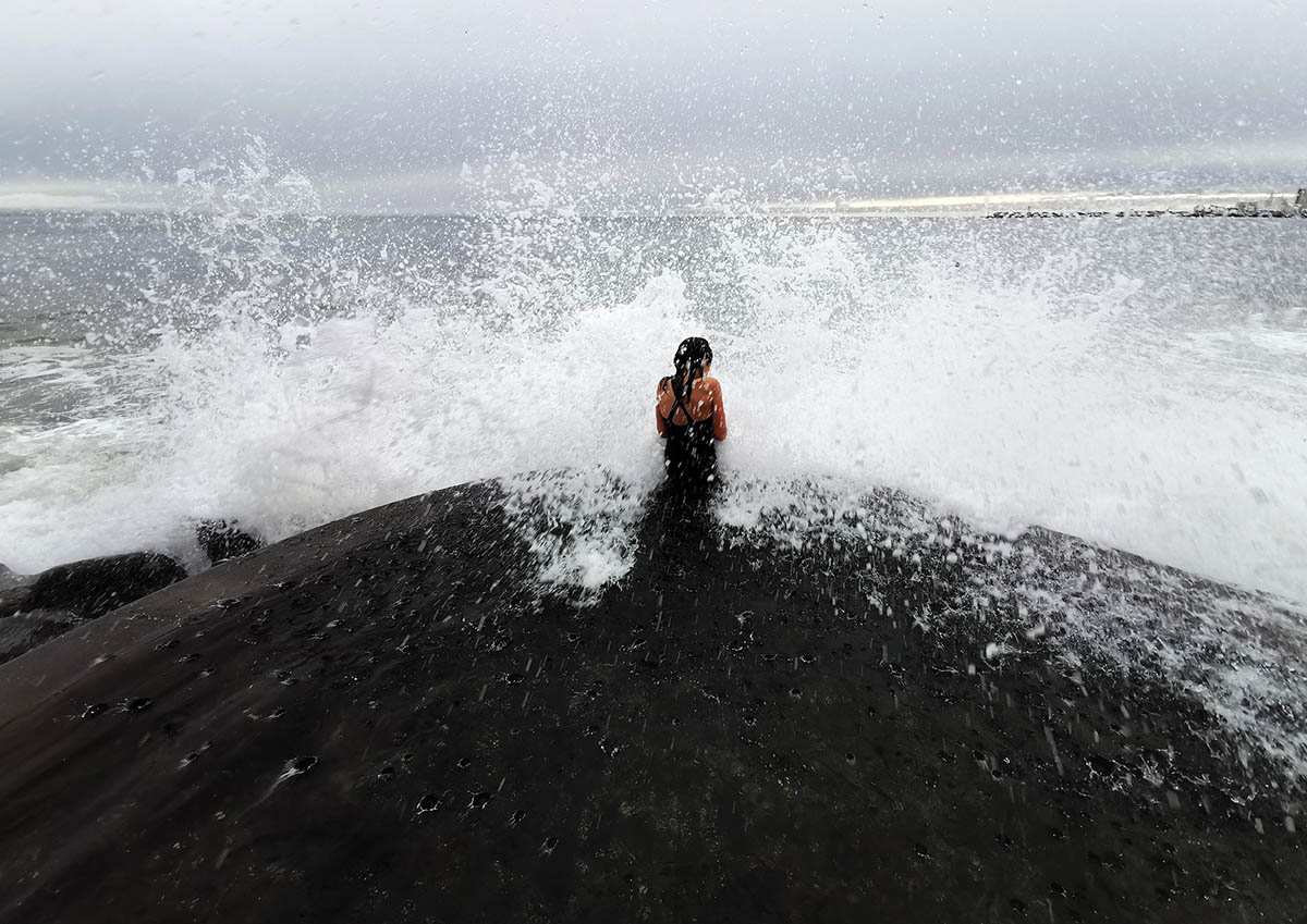 Basalt Architects' Guðlaug Baths inspired by little sea pools nestled in rocky barrier in Iceland