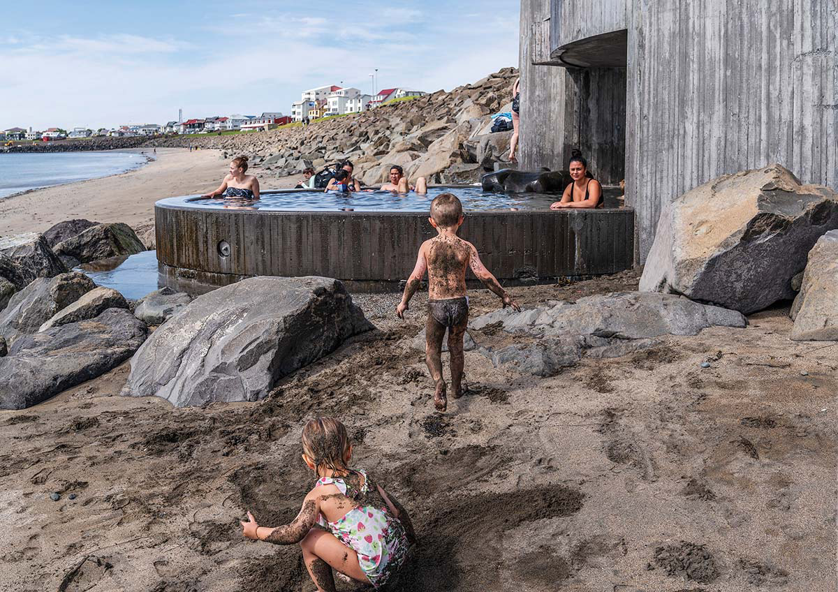 Basalt Architects' Guðlaug Baths inspired by little sea pools nestled in rocky barrier in Iceland