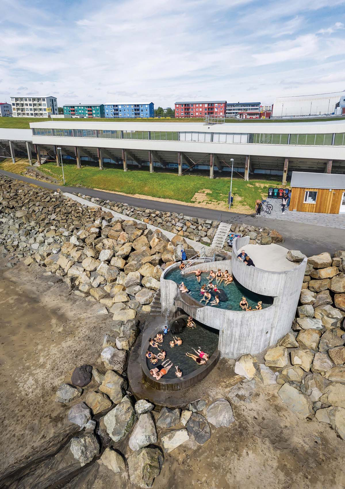 Basalt Architects' Guðlaug Baths inspired by little sea pools nestled in rocky barrier in Iceland