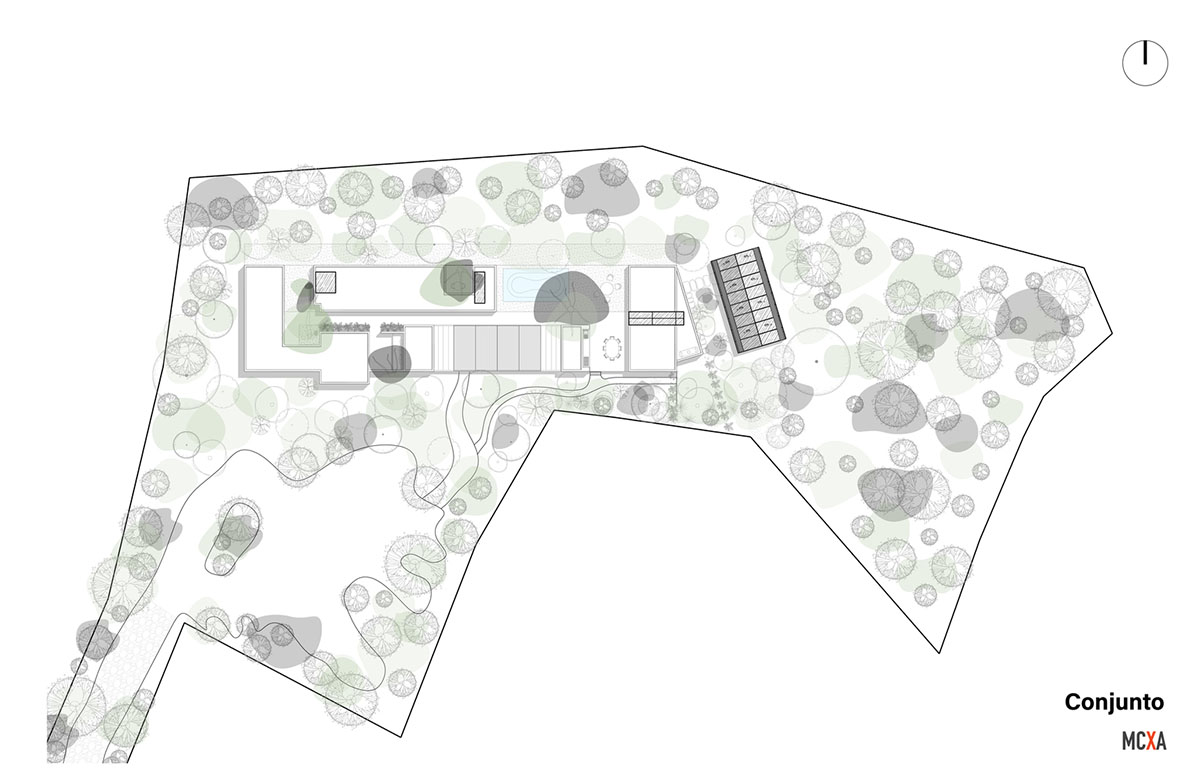 Mauricio Ceballos X Architects enriches Mague House with carved-out spaces within abundant vegetation