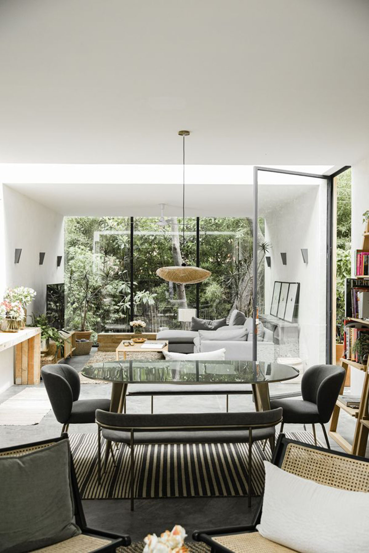 Mauricio Ceballos X Architects enriches Mague House with carved-out spaces within abundant vegetation