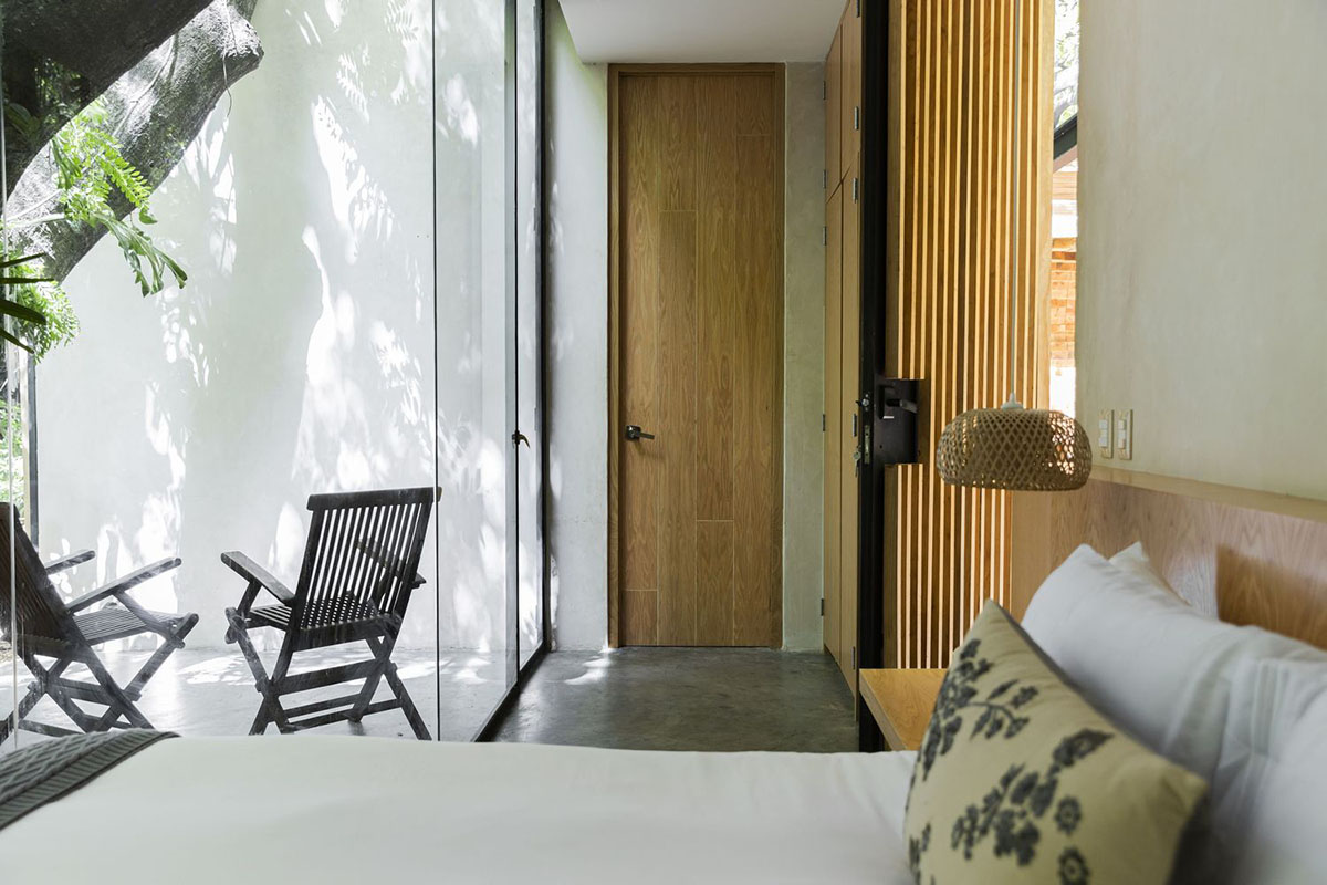 Mauricio Ceballos X Architects enriches Mague House with carved-out spaces within abundant vegetation