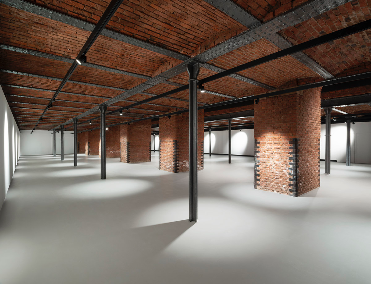 Carmody Groarke completes gallery that features brick vaulted ceilings and back-lit panels