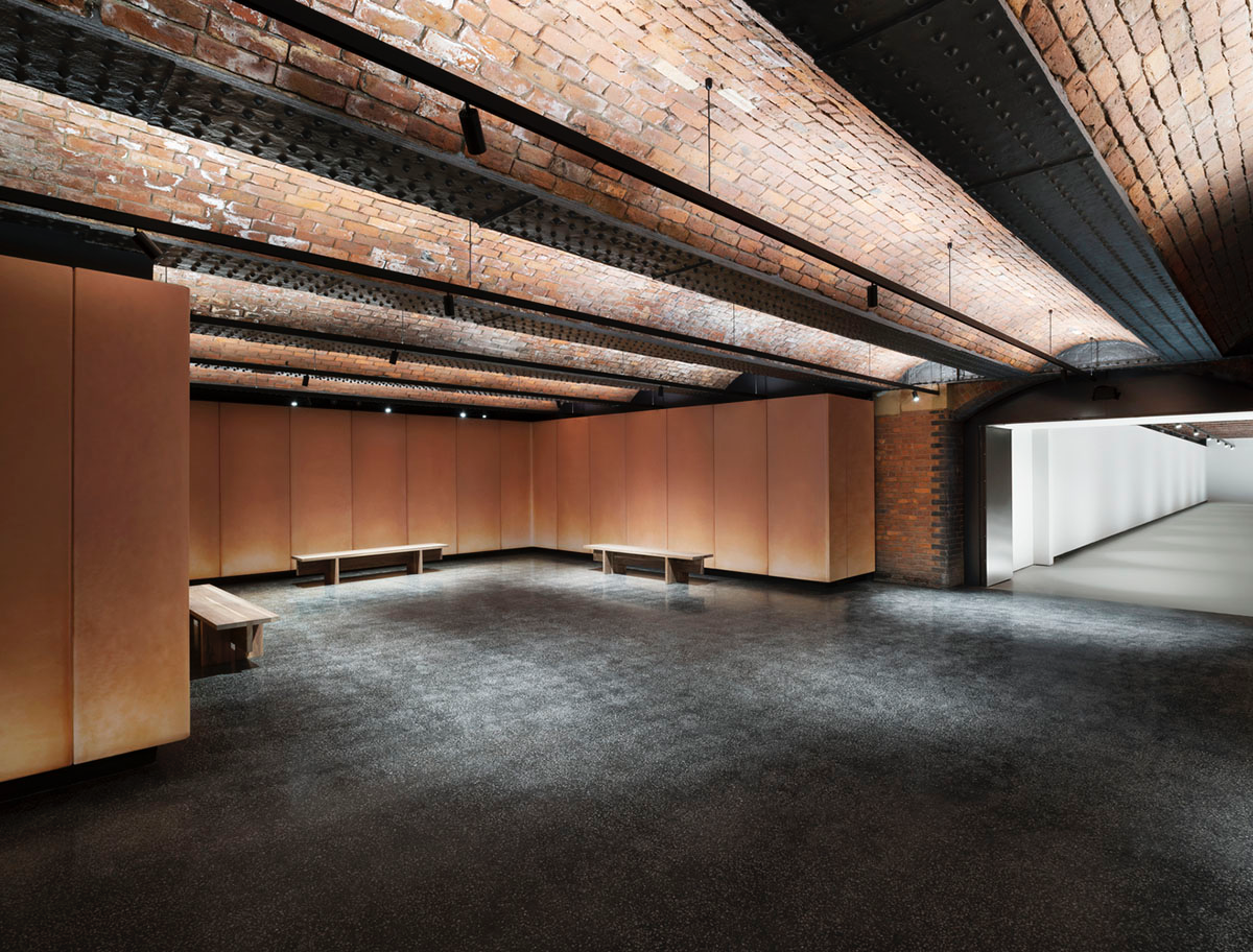 Carmody Groarke completes gallery that features brick vaulted ceilings and back-lit panels