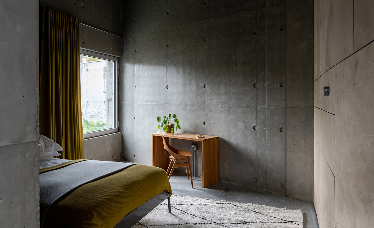 Raw Architecture Workshop interlocks concrete volumes for this family home in Lewes
