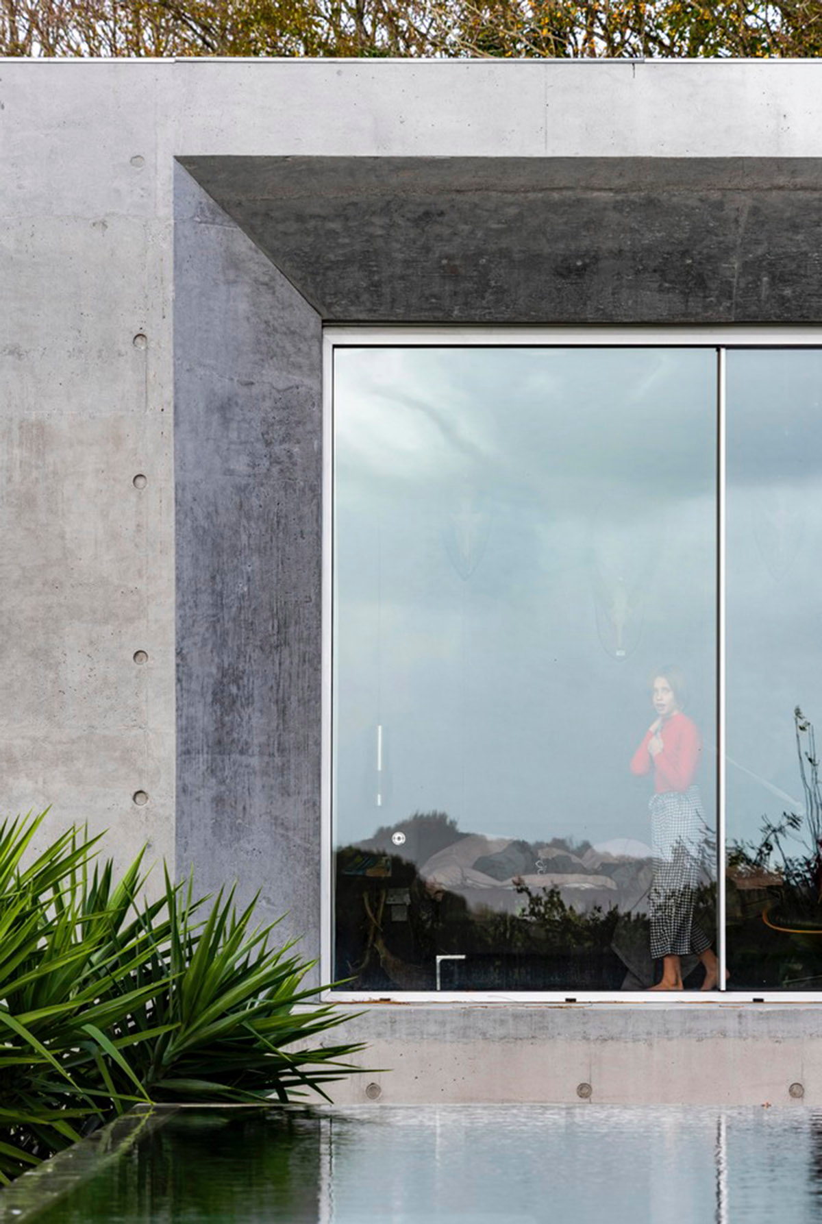 Raw Architecture Workshop interlocks concrete volumes for this family home in Lewes