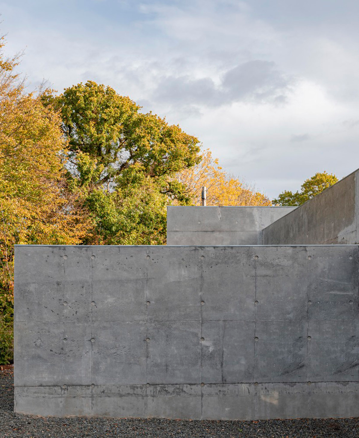 Raw Architecture Workshop interlocks concrete volumes for this family home in Lewes