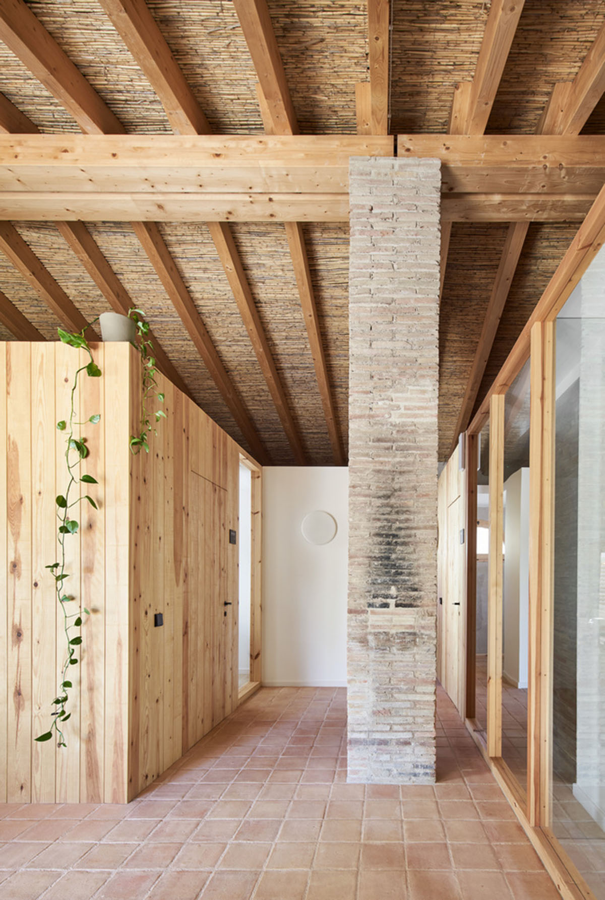 Aigua de Vilaju&iuml;ga restored with vaulted bricks and exposed concrete bringing light into the space