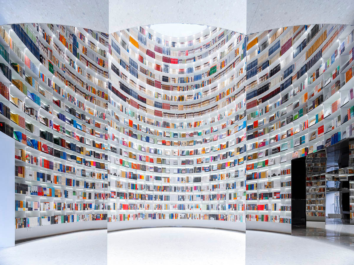 Ten towering cylindrical cement silos are converted to house immersive library of books in China