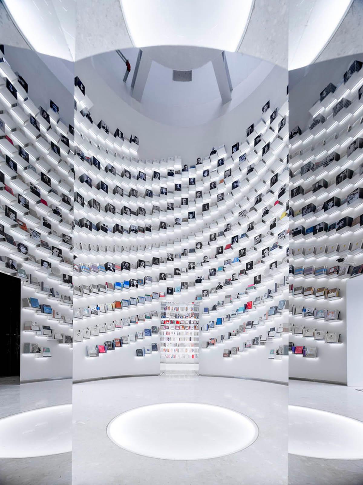 Ten towering cylindrical cement silos are converted to house immersive library of books in China