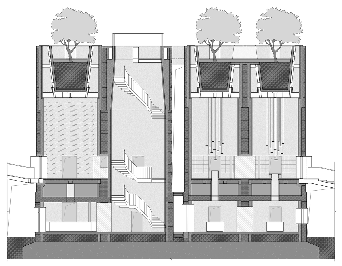 Ten towering cylindrical cement silos are converted to house immersive library of books in China