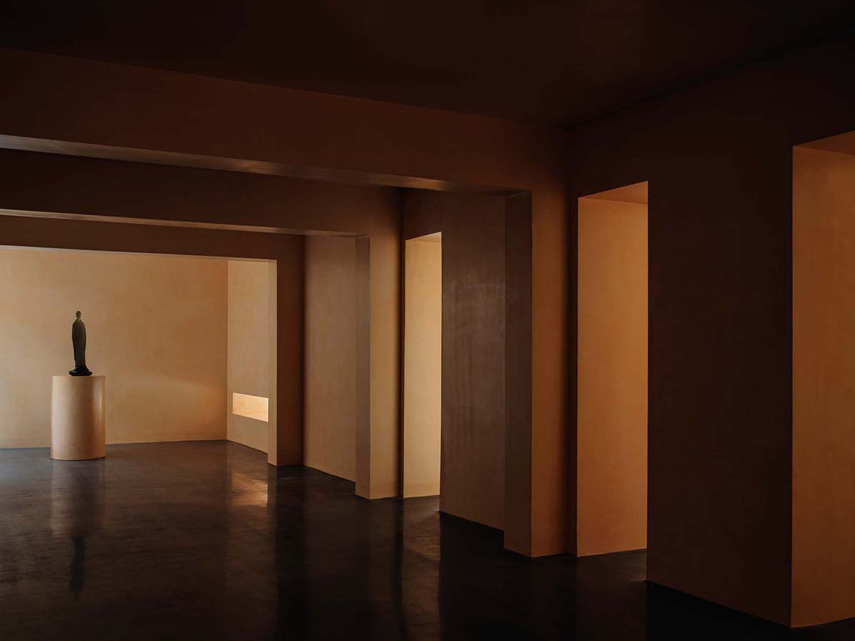 Ladder-Like sandalwood yellow volumes form Buddha artist's exhibition space and studio in China