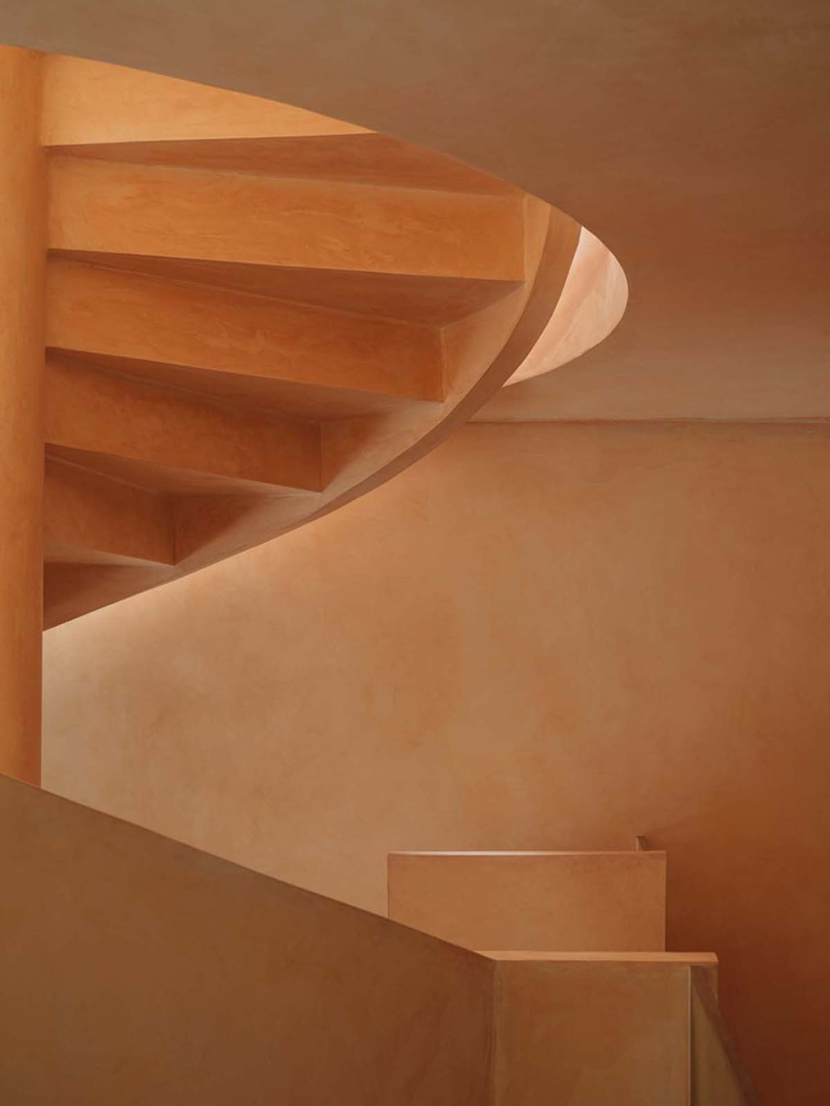 Ladder-Like sandalwood yellow volumes form Buddha artist's exhibition space and studio in China