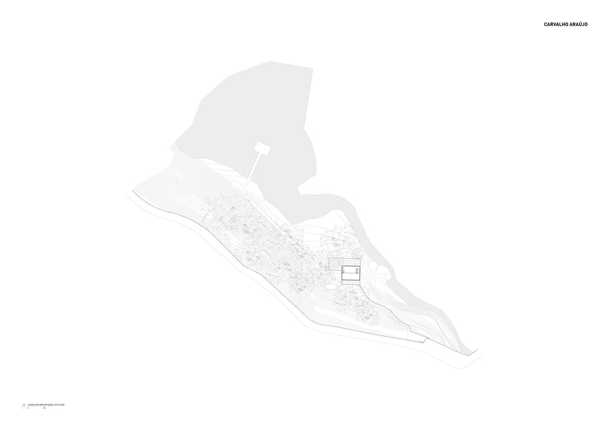 Carvalho Ara&uacute;jo designed singular concrete volume overlooking a lush forest in Portugal