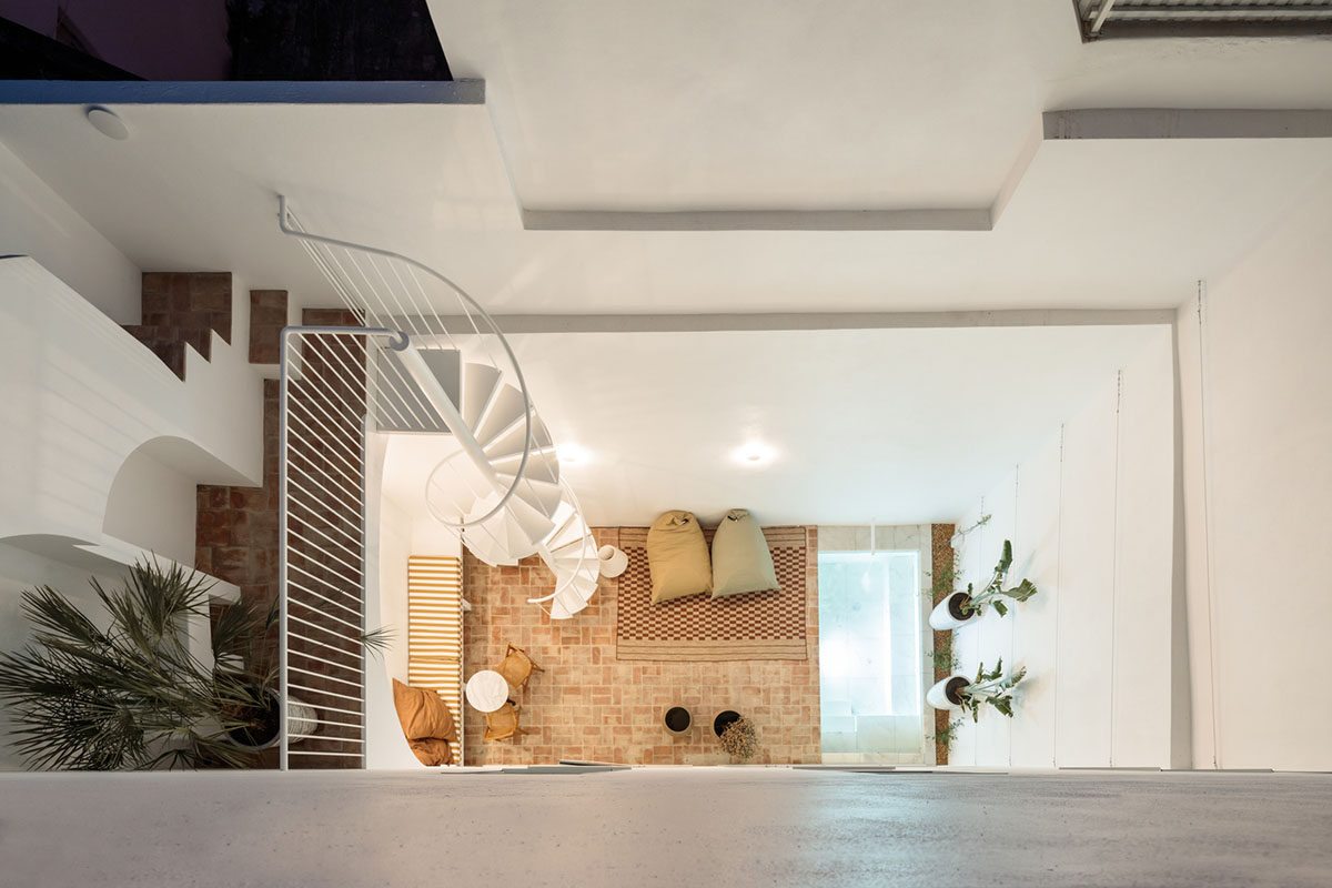 atelier RUA converts old warehouse into residence enriched with social spaces in Olhão