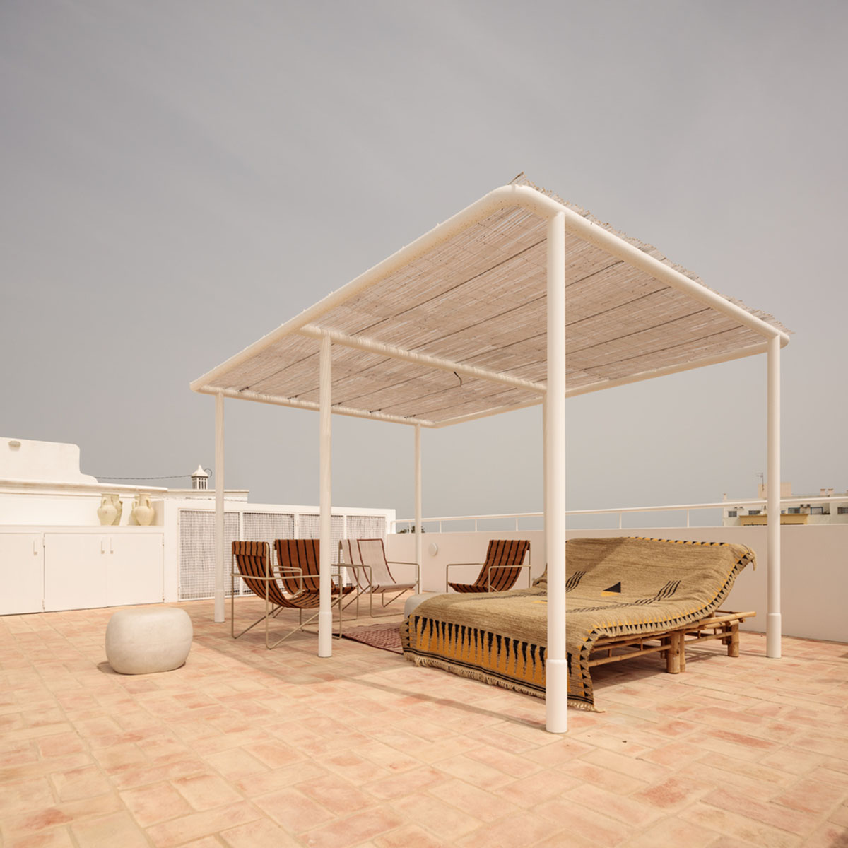 atelier RUA converts old warehouse into residence enriched with social spaces in Olhão