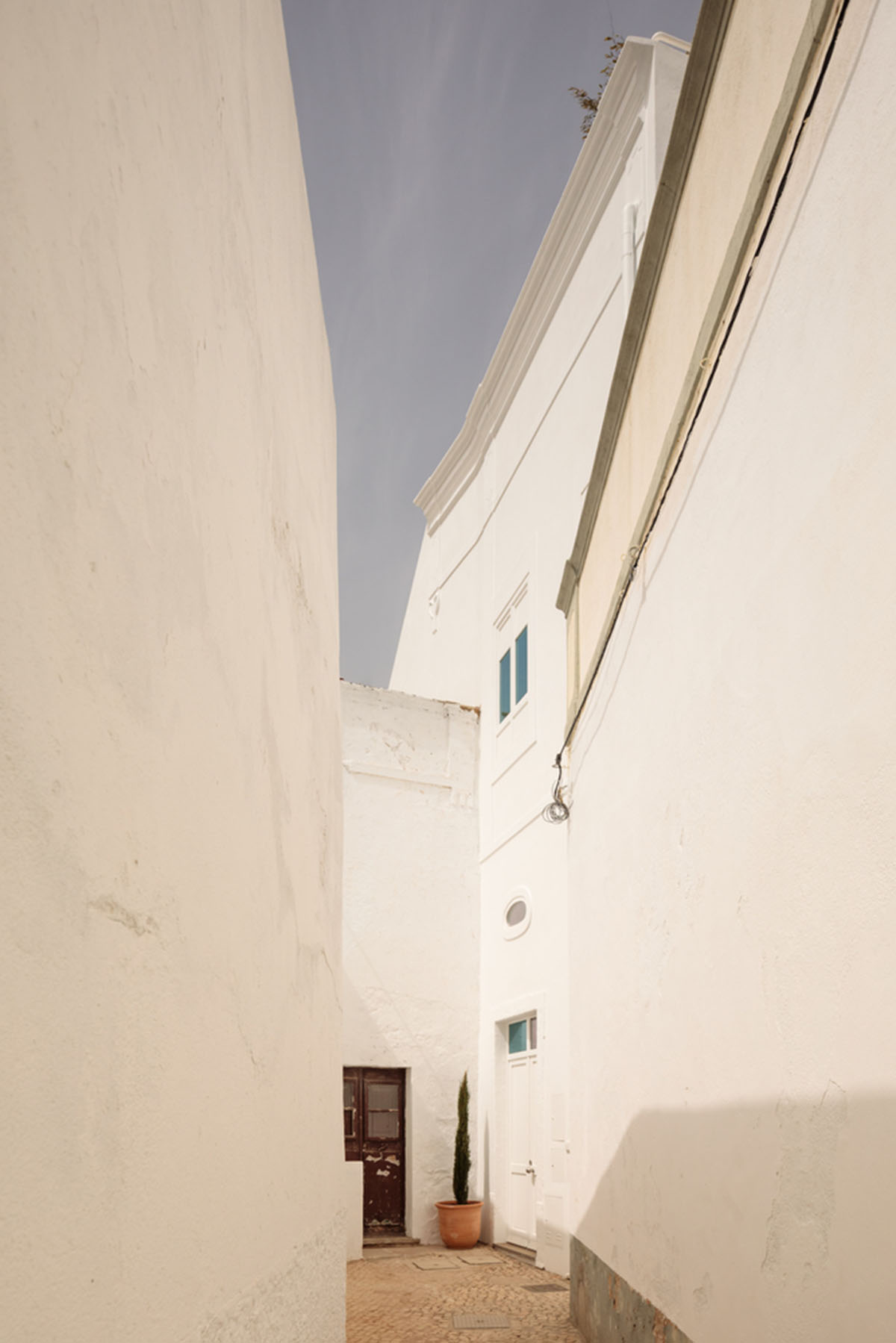 atelier RUA converts old warehouse into residence enriched with social spaces in Olhão