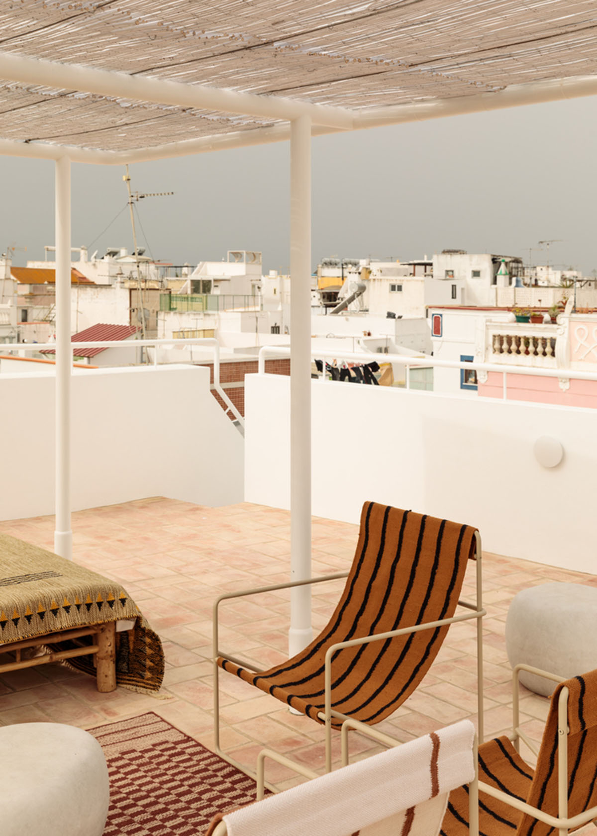 atelier RUA converts old warehouse into residence enriched with social spaces in Olhão