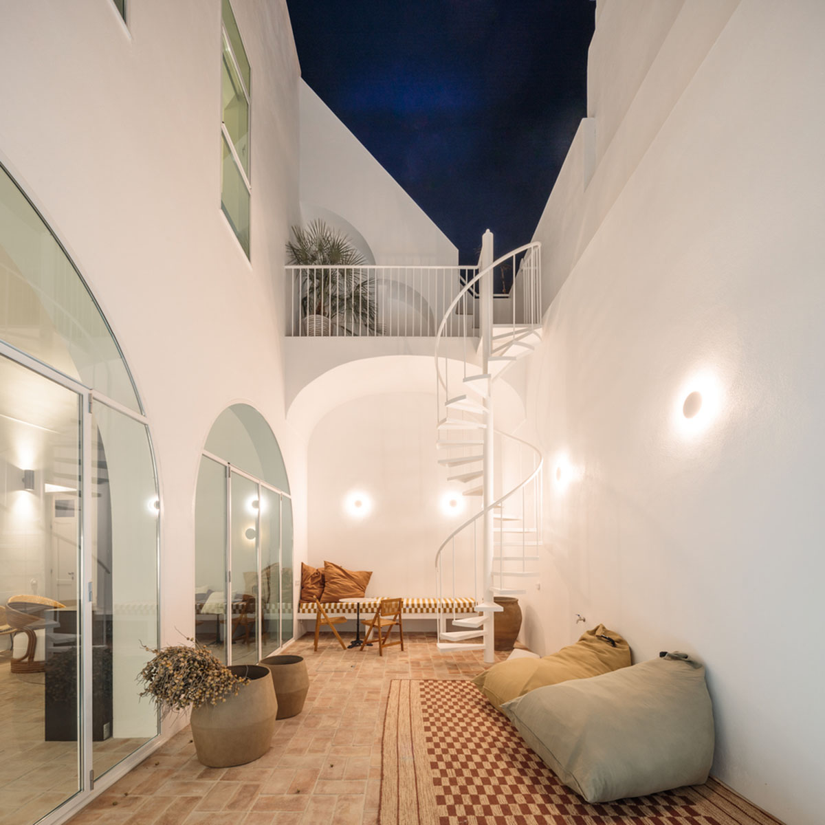 atelier RUA converts old warehouse into residence enriched with social spaces in Olhão