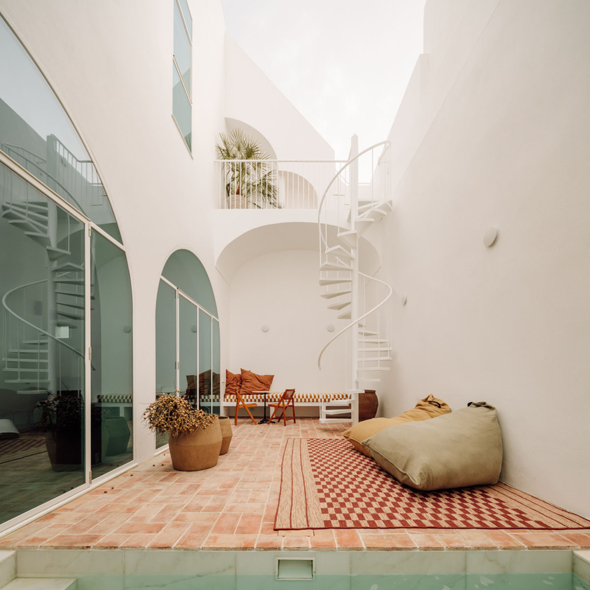 atelier RUA converts old warehouse into residence enriched with social spaces in Olhão