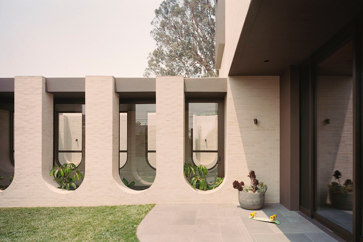Studio Bright extends Ruckers Hill House with inverted Roman aqueduct in Northcote