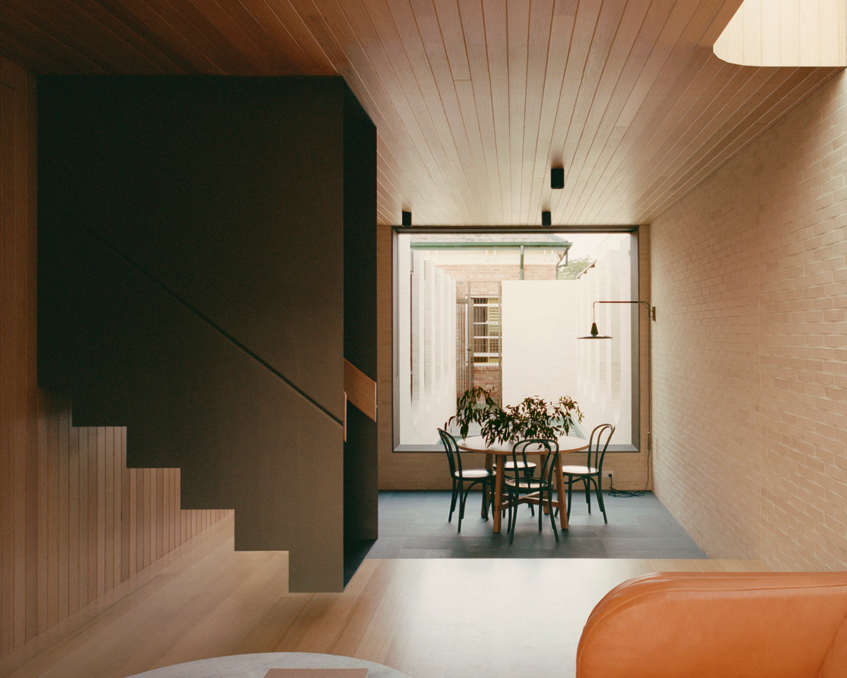 Studio Bright extends Ruckers Hill House with inverted Roman aqueduct in Northcote