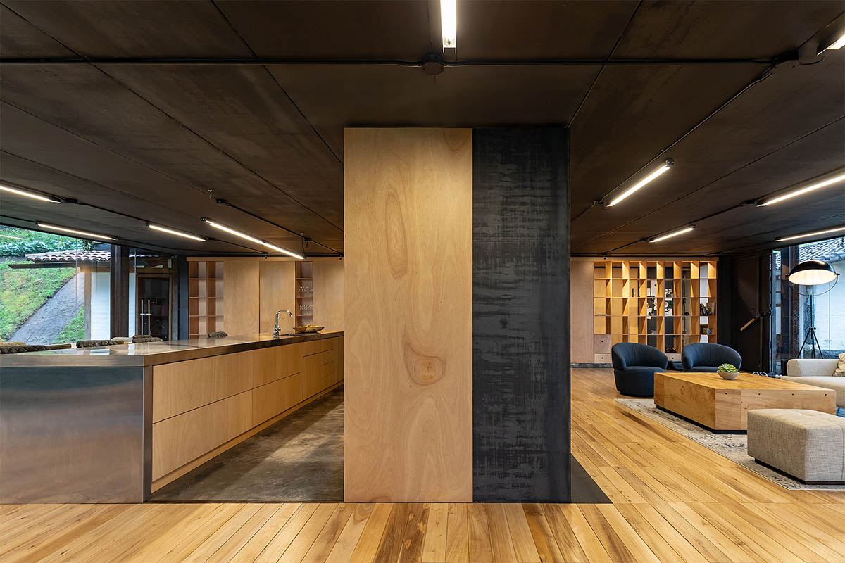 RAMA estudio built glazed retreat that sits on slope with minimal touch overlooking valley in Ecuador