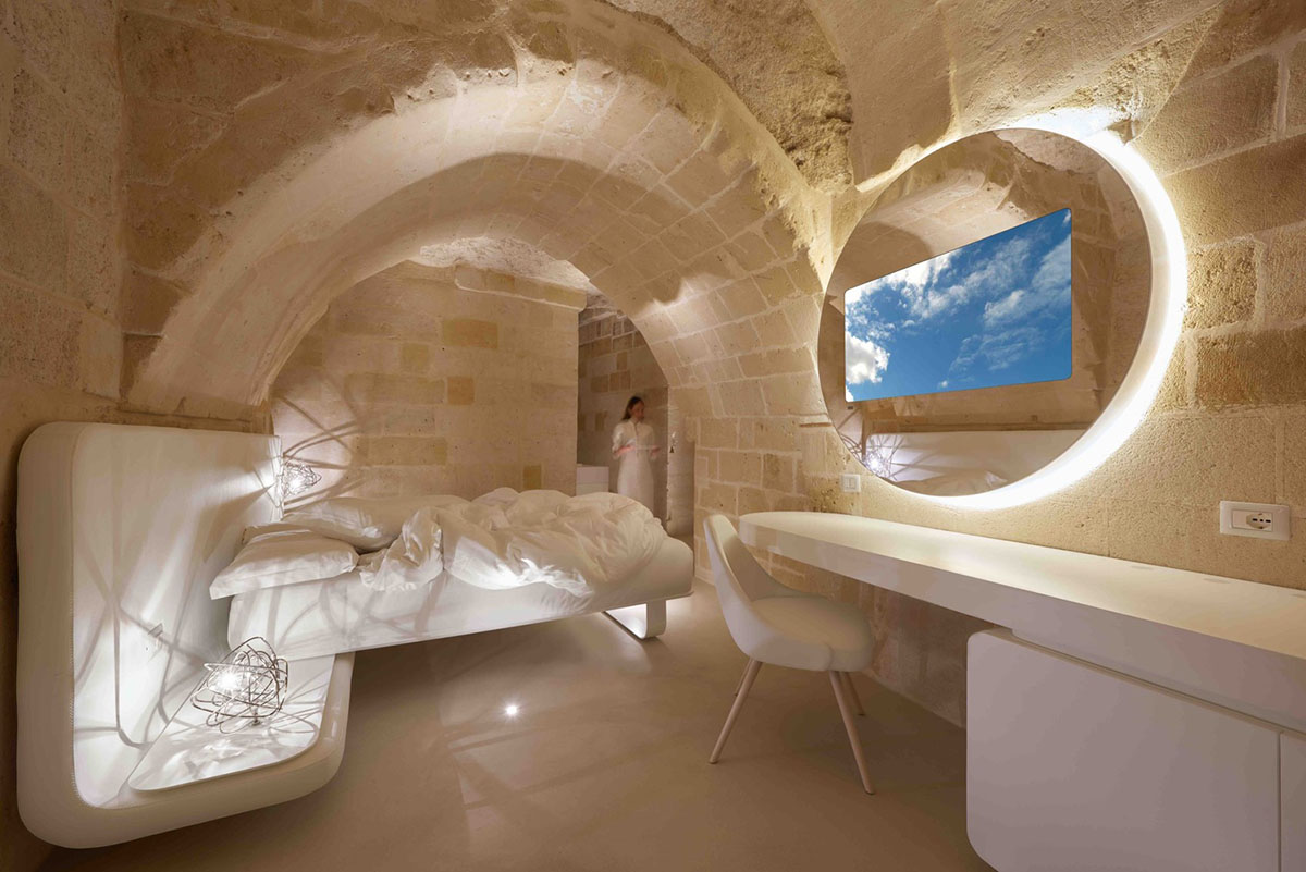 Interiors of this cave hotel and spa by Simone Micheli act like work of art with excavated surfaces